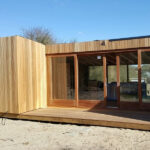 Casco van een houten vakantiewoning in de duinen bij Egmond