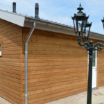 Houten mantelzorgwoning in de tuin in Groessen met horizontale houten gevelbekleding